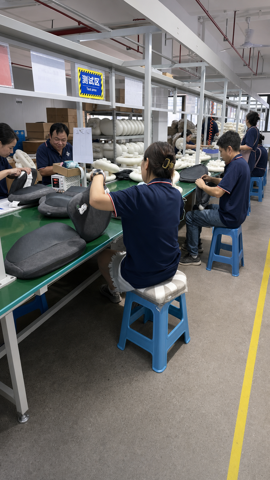 Team testing massage products on the production line